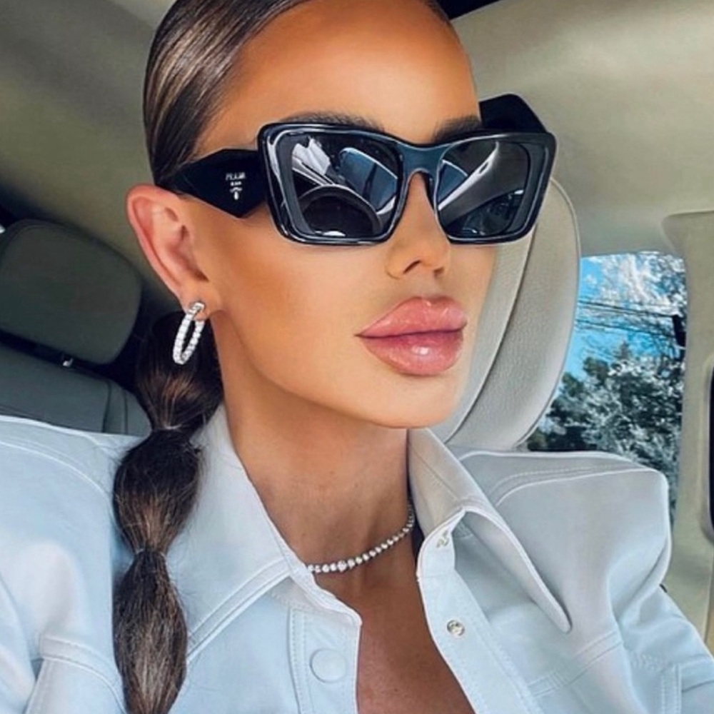 Summer Sale. ☀️ Authentic black Prada sunglasses beautiful condition.